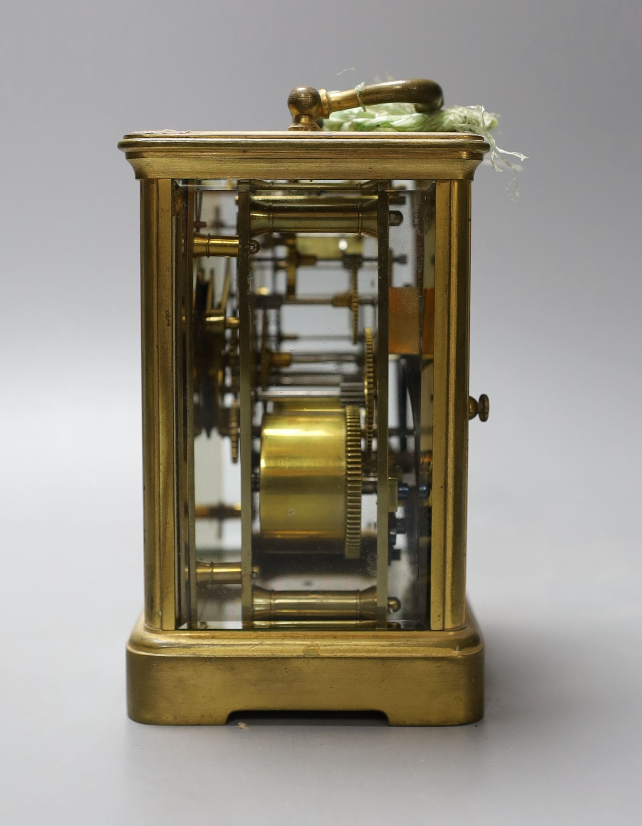 A leather cased brass carriage clock